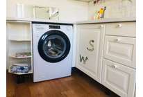 Candy Smart Pro CO34105TB1/2-07: узкая стиральная машина с широкими возможностями