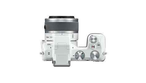 Беззеркальный фотоаппарат Nikon 1 V2 WH Kit + 10-30mm VR
